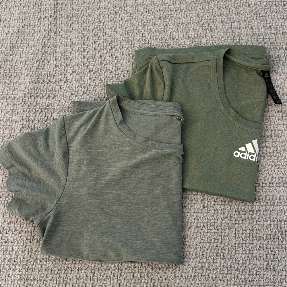 Two really cute stretchy work out tops